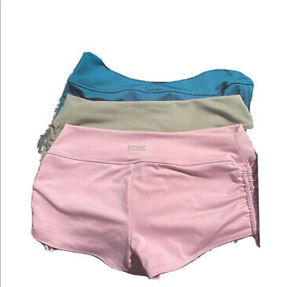 Pink Swim to Gym shorts. Size med. 2 NWT & 1 ( army green) NWOT. BUNDLE